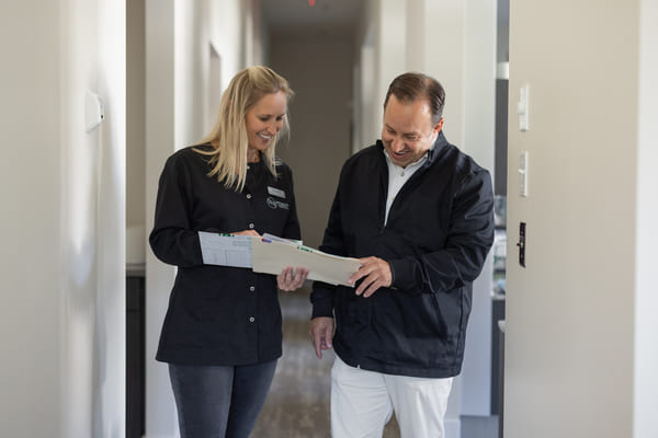 child with missing tooth smiling